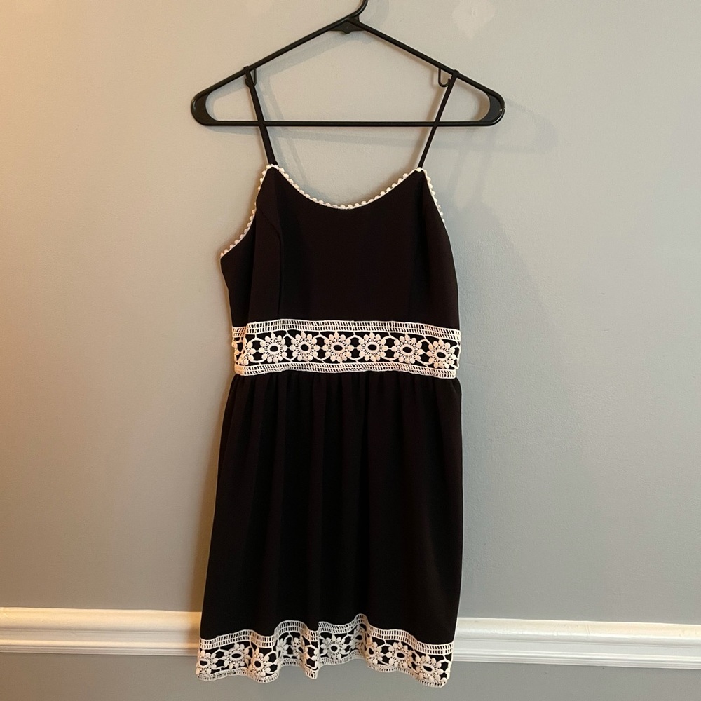 Black mini dress with crochet detailing